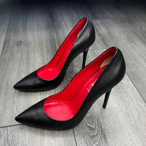 High heel black leather shoes